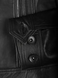Buttoned cuff detail on women’s black leather moto jacket