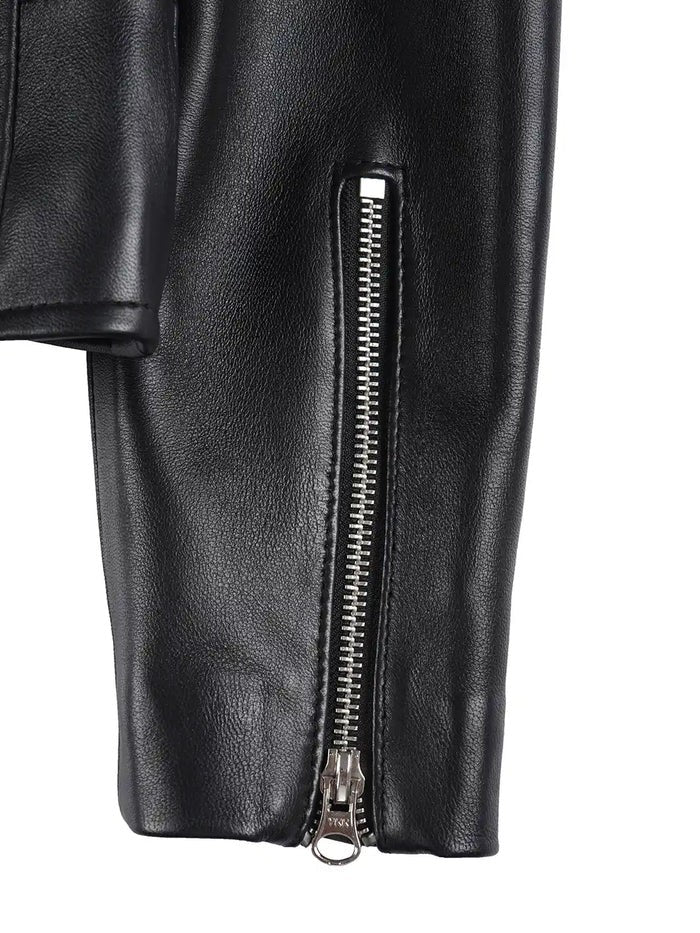 Close-up of zipper sleeve detail on women’s black biker leather jacket