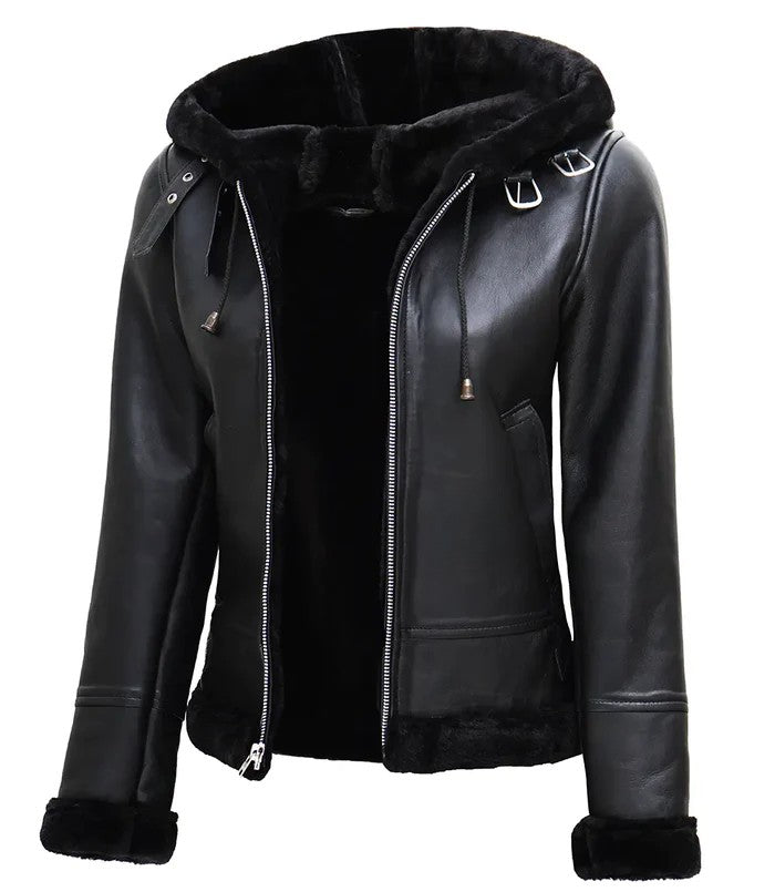 Side pockets of women’s black shearling moto jacket