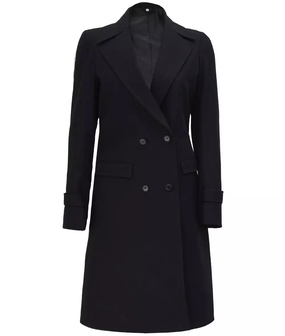 Front view of women’s black wool blazer coat with peak lapels and double-breasted closure