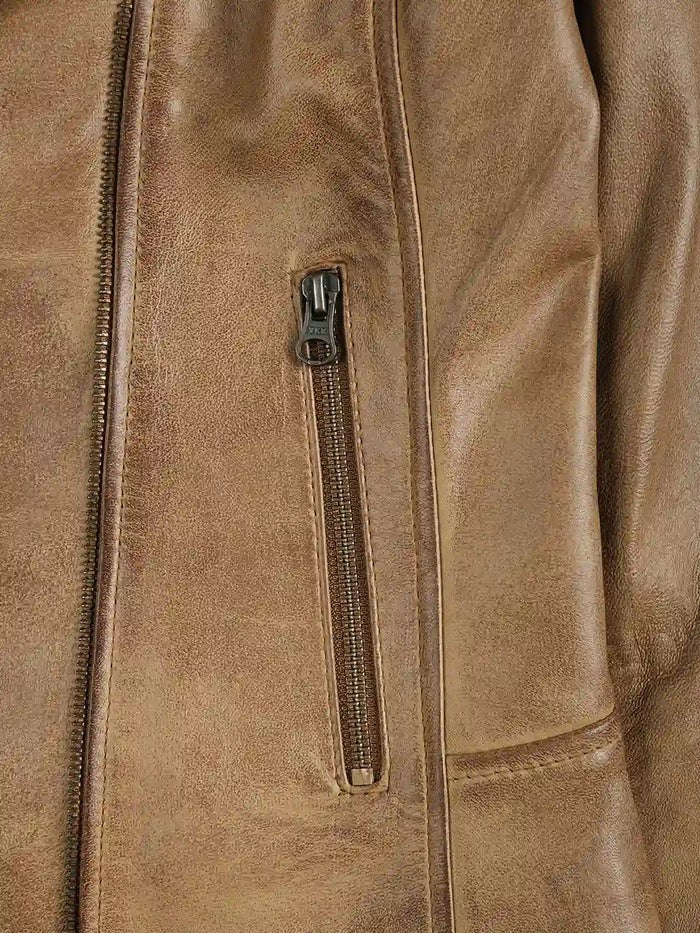 Close-up zipper pocket of women’s camel biker leather jacket