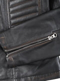 Zipper detail on dark brown biker leather jacket