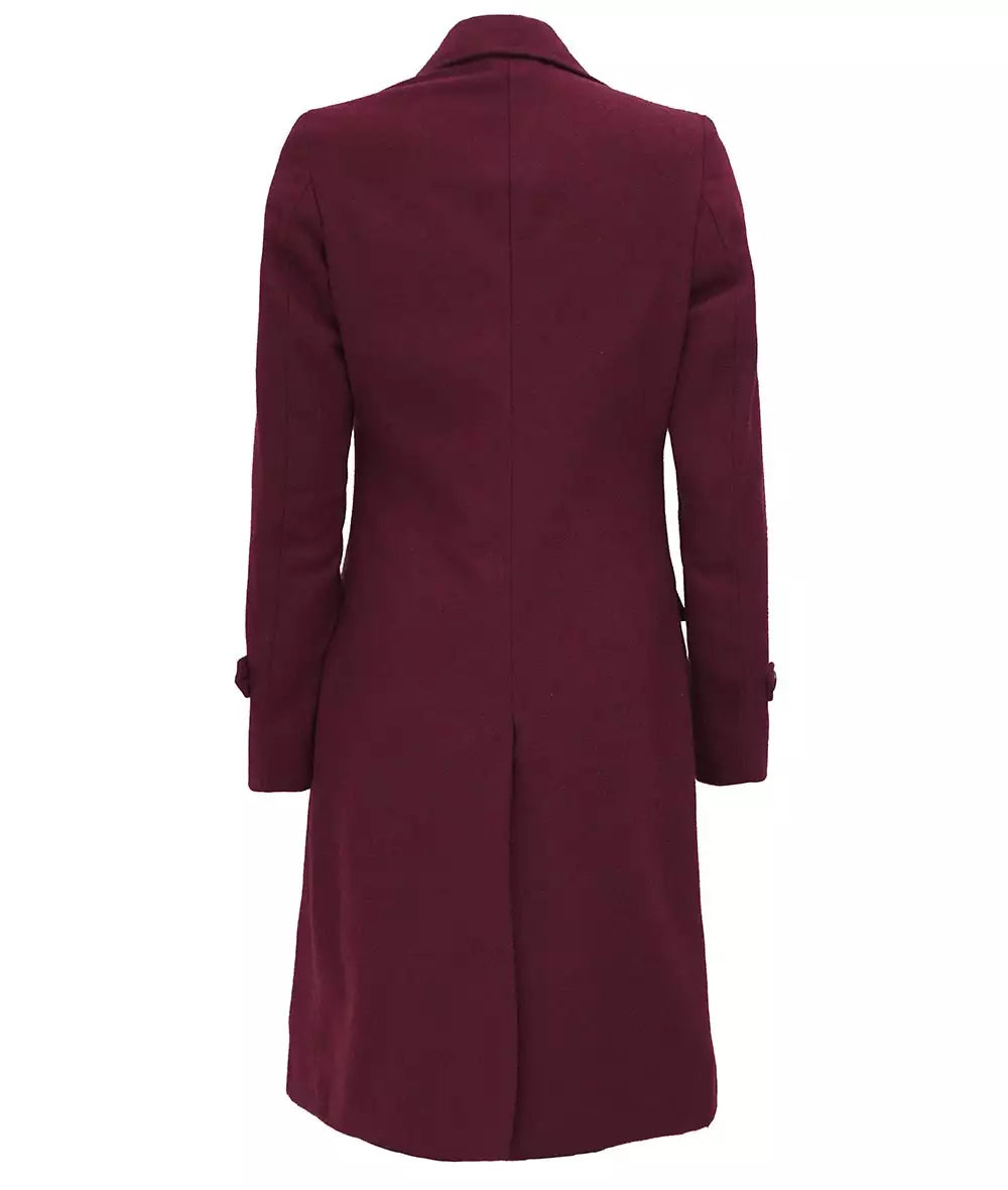 Front view of women’s maroon wool coat with double-breasted closure and peak lapels