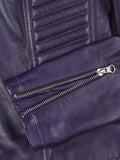 Close-up of zipper detail on purple biker leather jacket