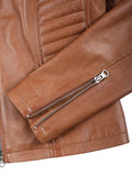 Close-up zipper cuff on tan biker leather jacket
